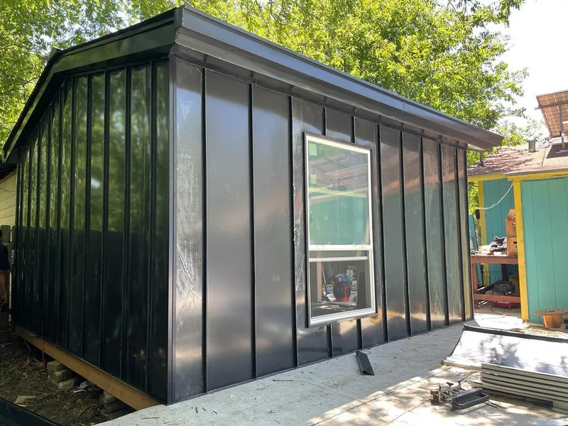 Black standing seam metal wall panels for Metal Roof Installation in Media